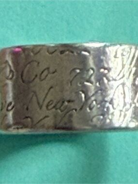 Tiffany & Co. Engraved Silver Band with Aqua Background Accent